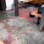 Stained concrete with polyaspartic coating